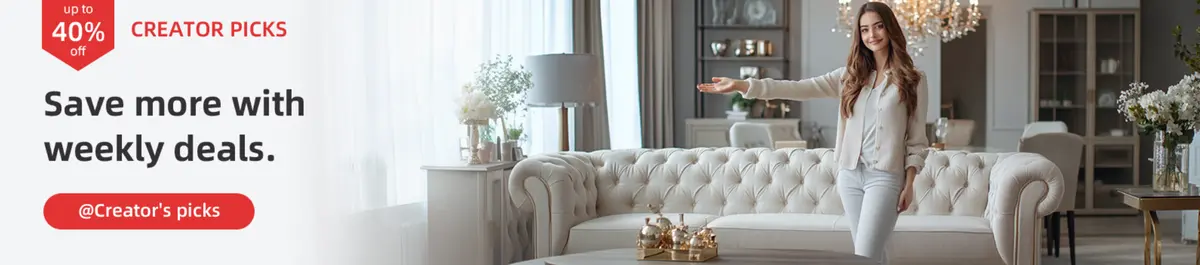 A parent lying on a mustard yellow couch lifting a child playfully in the air, both wearing casual clothes and colorful socks